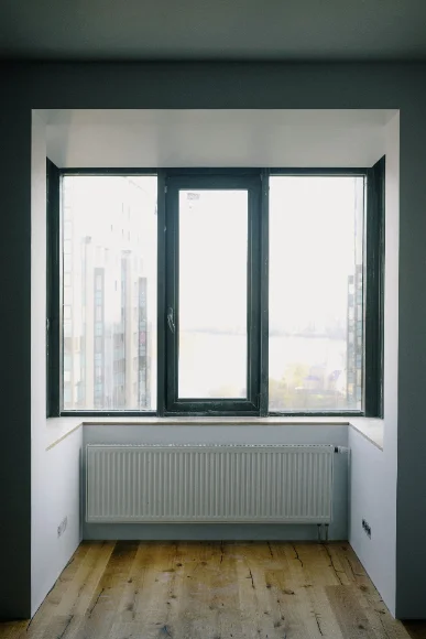 Apartment building windows being cleaned from outside